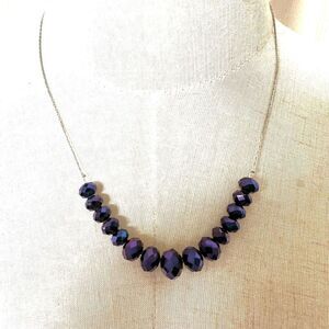 Purple floating beads necklace